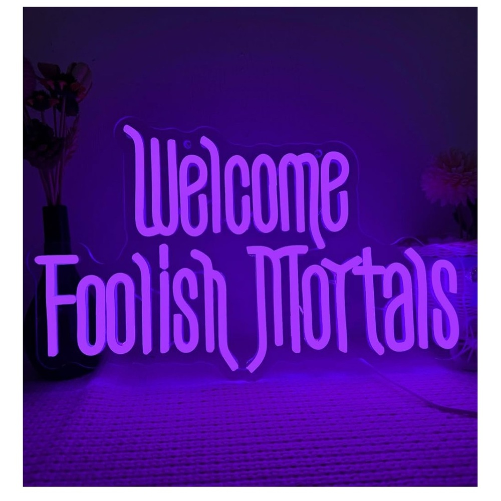 Purple Neon Sign 'Welcome Foolish Mortals'